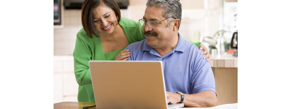couple-in-kitchen-with-laptop-web