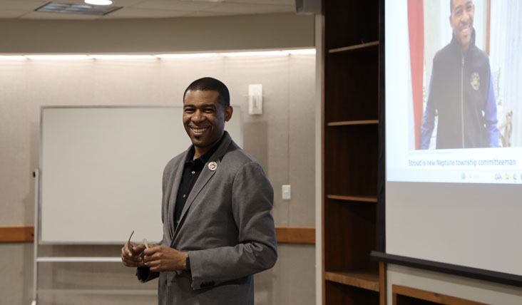 Derel speaks with students in Professor Jonathan Moschberger’s history class at Brookdale.