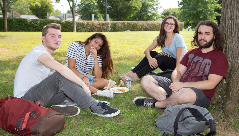 students on the grass