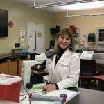 Picture of Deborah Josko in a laboratory.