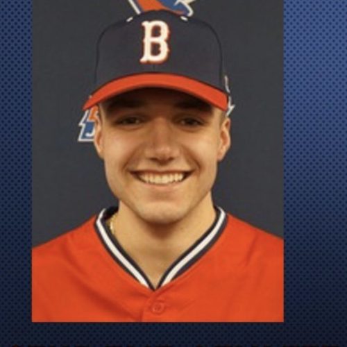 Ryan Gilmore Headshot Baseball hat on with Brookdale B on it. Wearing a baseball jersey.