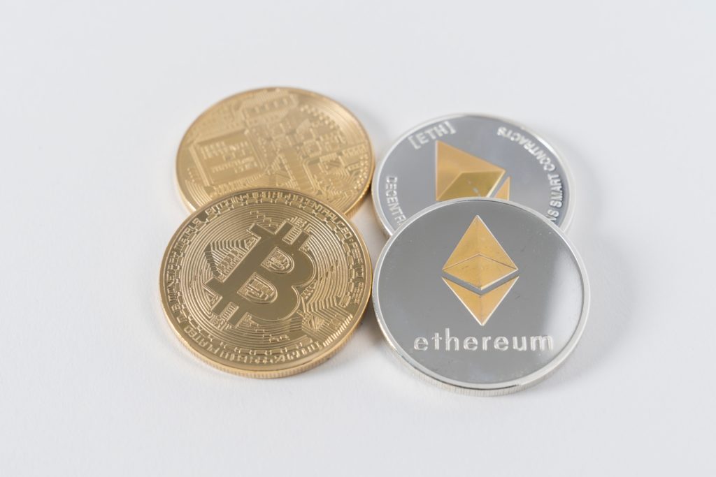 Physical coin representations of Bitcoin and Ethereum