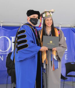 Dr. David Stout and graduate Dharany Roman.