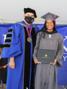 Brookdale graduate Mya Fisher with President David Stout.