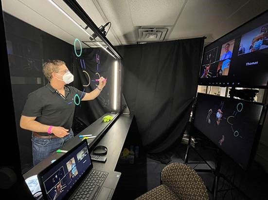 Faculty conducts Zoom meeting using lightboard