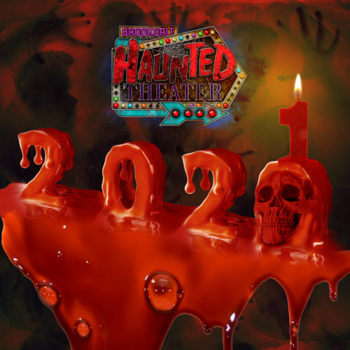 melted 2021 candles with arrows pointing to the haunted theater