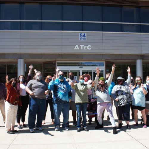 Group of Continuing & Professional Studies students in front of ATeC building on campus of Brookdale Community College