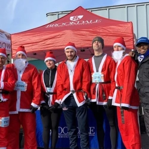 Runners in their santa suits