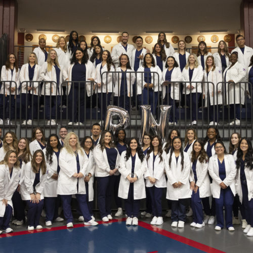 Group of 57 nurses at their pinning ceremony