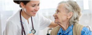 nurse looking down on elderly patient