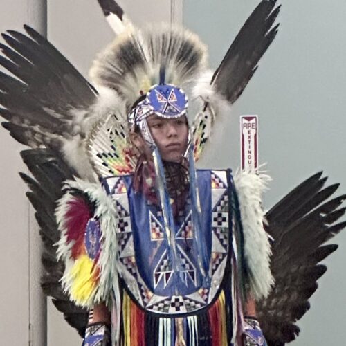 Native American in full regalia.