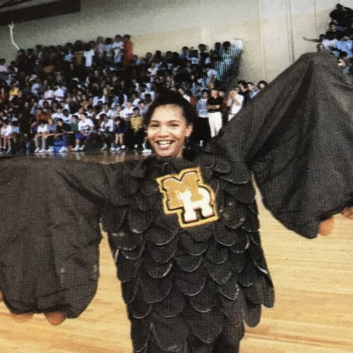 Woman in an eagle mascot costume.