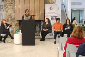 Panel of men and women sitting in the Caroline Huber Holistic Wellness Center