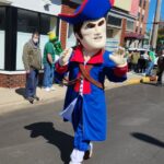 Brookdale Jersey Blue Mascot walking in the parade.