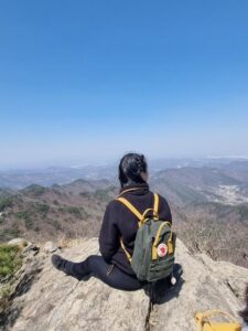 Brittany Scardgno looking at the mountains of Korea