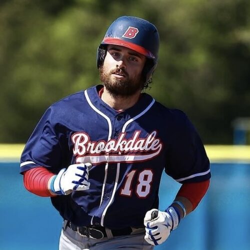 Baseball player running around the bases.