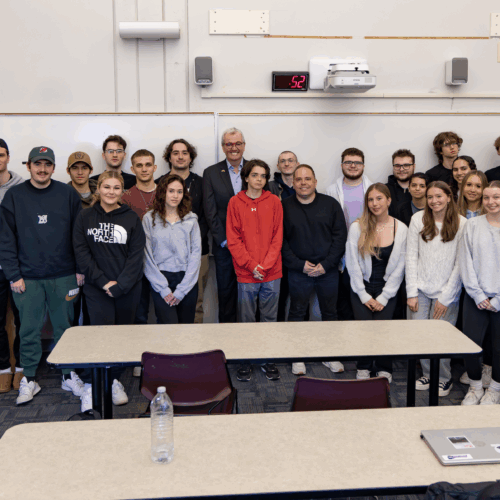 Large classroom of students and NJ Governor Murphy