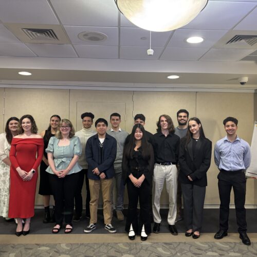 13 Honors Students during their Symposium presentations