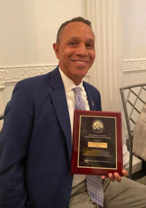 Ed Johnson after Receiving The Elbert k. Fretwell Outstanding Educator Award