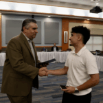 Eduardo Coelho and President Stout shaking hands. Brookdale Students Win First Place in National Architecture Competition for Visionary Wellness Center Design