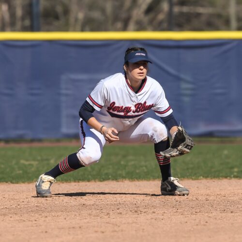 Jillian Fay scooping up a ground ball