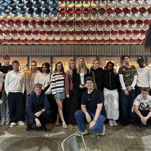 Danish student in Asbury Park under American Flag