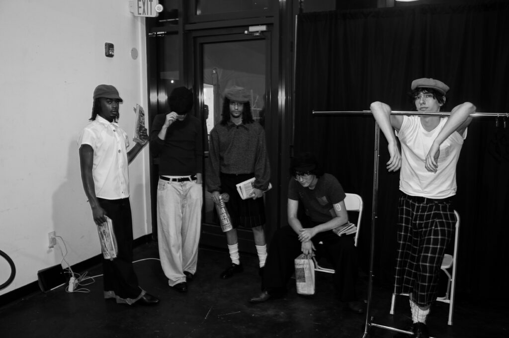 Tyler Krisman First Place collection Paper Route. The models backstage.