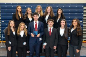 group of students who won a trophy
