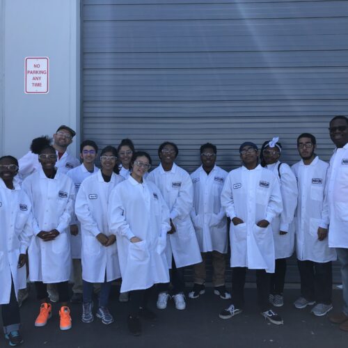 Dr. Devon Stewart with students at Sacremento City College