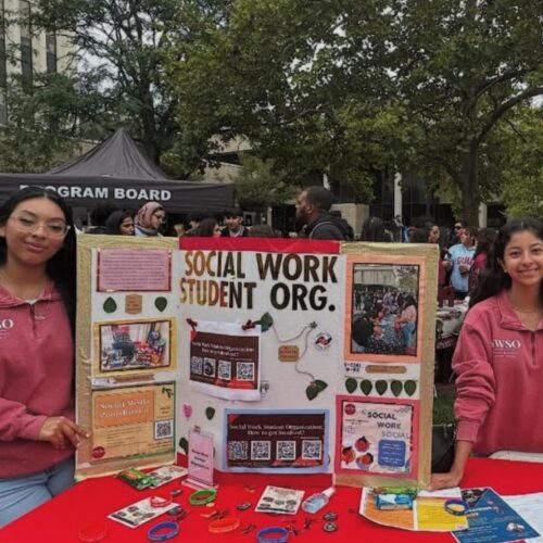 Brilliza Jimenez (left), a senior Rutgers Statewide student at Brookdale, works a tabling event at Rutgers-Newark in her role as vice president of the Social Work Student Organization. Photo courtesy of Brilliza Jimenez